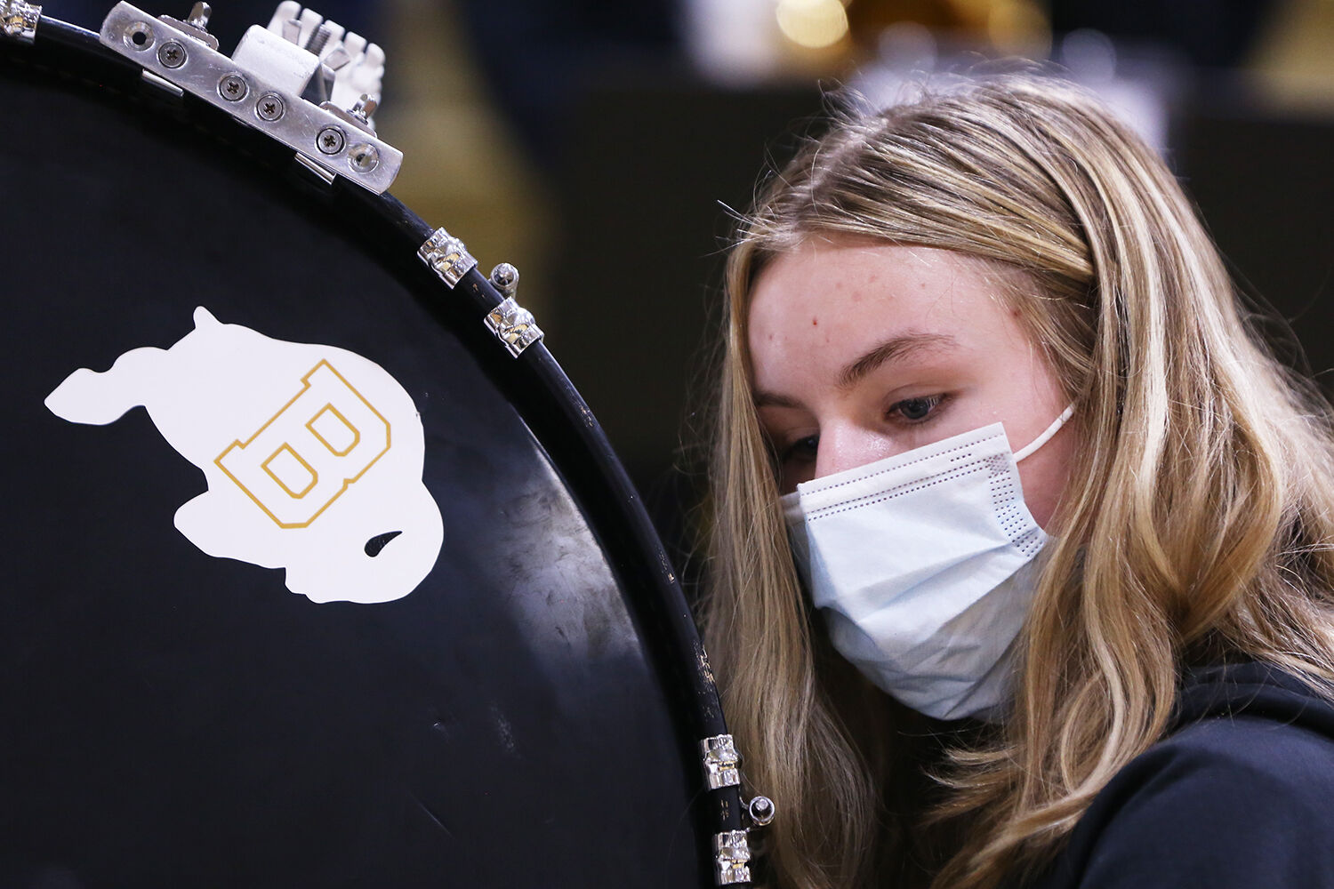 Anna Briscoe reads her music from the front of the stands
